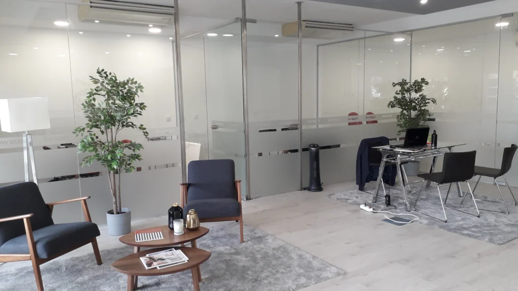 The welcome area of the KW Select Market Center in Cascais, where real estate agent John Redin works to find the ideal property for his clients.